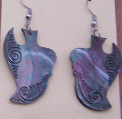 earring black mop carving