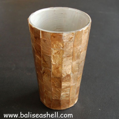 capis shell covered glass water