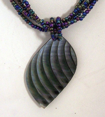 Black mop necklace carved