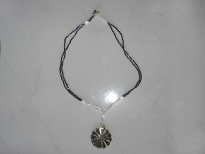 turbo small necklace carved