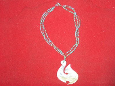 pen necklace made from brown shell