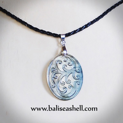 black mother of pearl tahitian carving