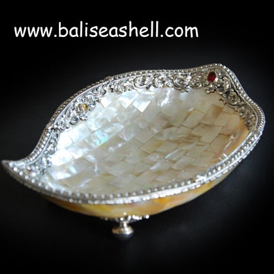 carving silver crafts with mop bowl
